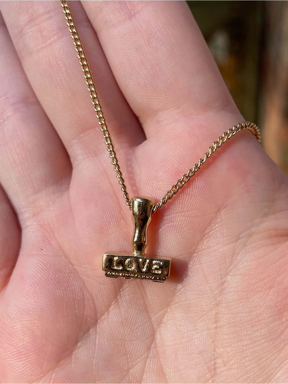 Avon 'LOVE' Stamp Pendant Necklace